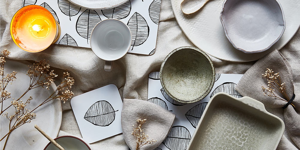 Setting the table with placemats and coasters